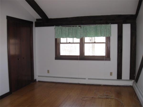 120 Rocky Hill Road Scituate, RI 02857 - Photo 9 of 14 a view of an empty room with a window