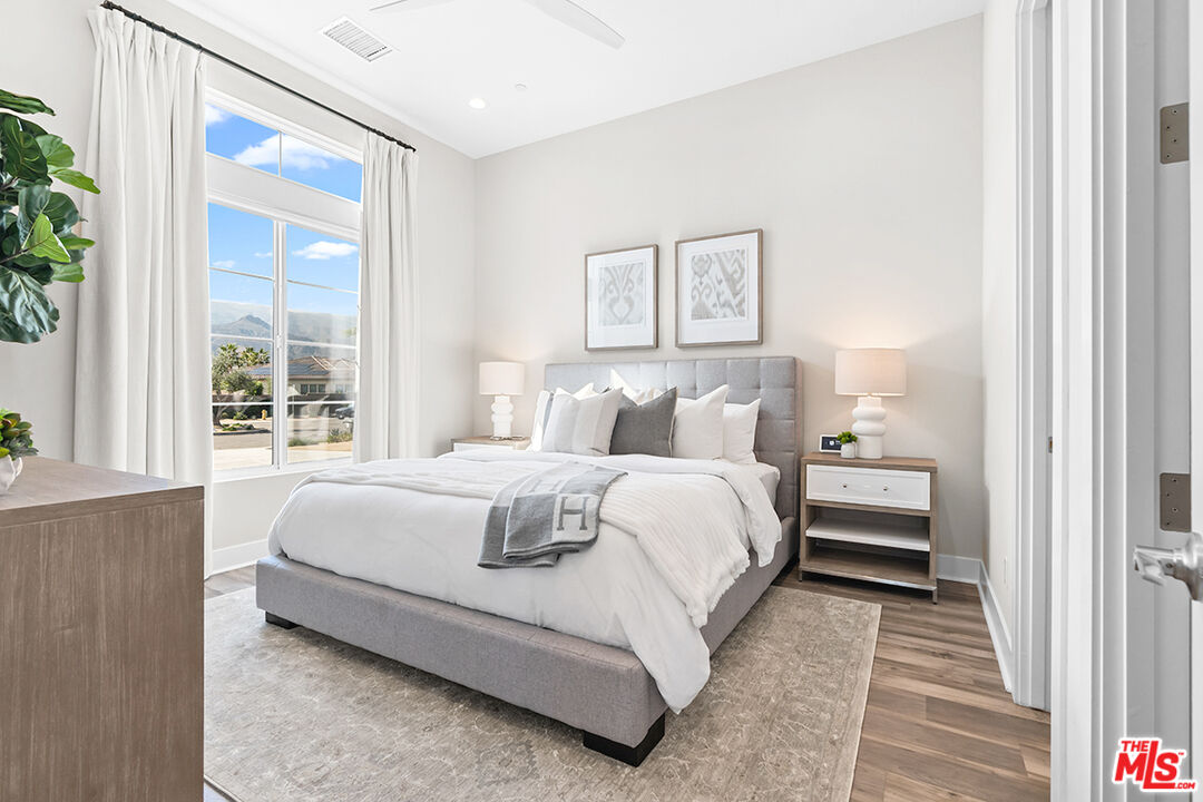 80464 Old Rnch Trail North La Quinta, CA 92253 - Photo 24 of 42 a bedroom with a bed and a window