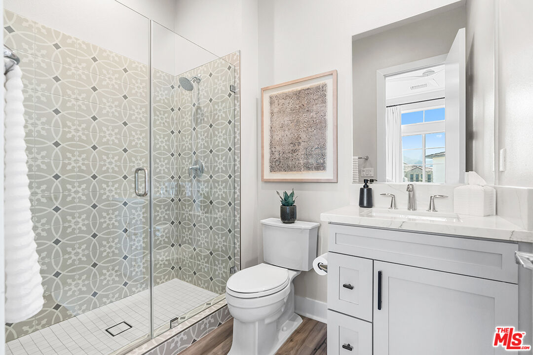 80464 Old Rnch Trail North La Quinta, CA 92253 - Photo 26 of 42 a bathroom with a sink toilet and shower