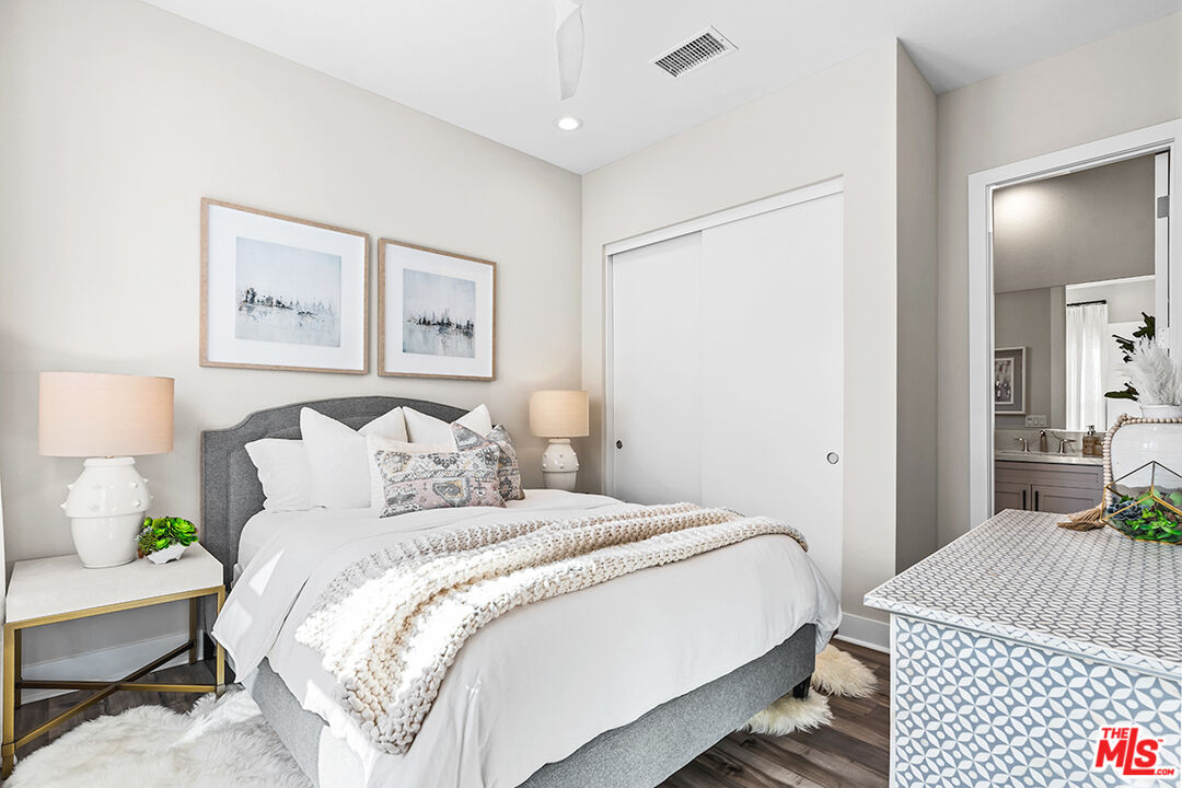 80464 Old Rnch Trail North La Quinta, CA 92253 - Photo 29 of 42 a bedroom with a bed and a couch