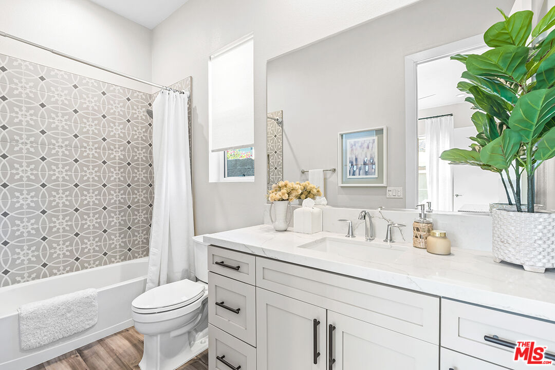 80464 Old Rnch Trail North La Quinta, CA 92253 - Photo 30 of 42 a bathroom with a sink a toilet and tub