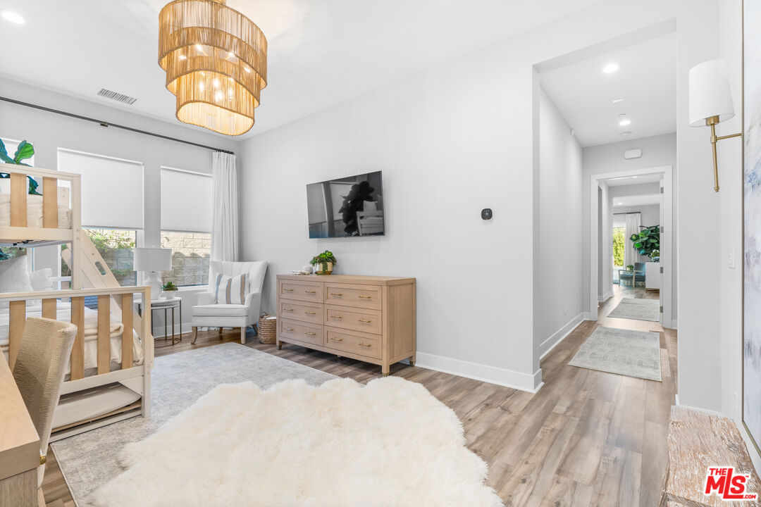 80464 Old Rnch Trail North La Quinta, CA 92253 - Photo 32 of 42 a bedroom with furniture and a window