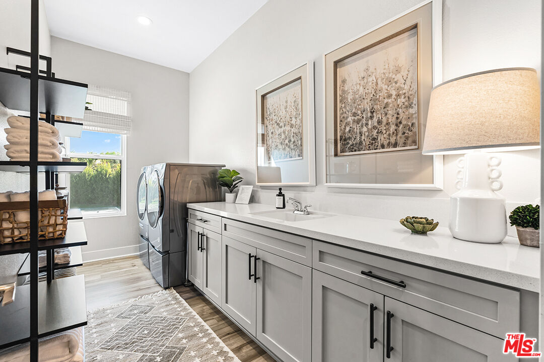 80464 Old Rnch Trail North La Quinta, CA 92253 - Photo 33 of 42 a kitchen with a sink appliances and a window