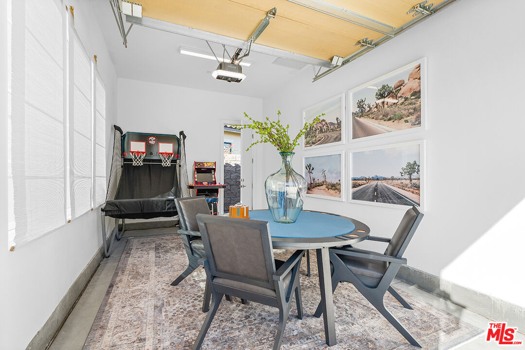 80464 Old Rnch Trail North La Quinta, CA 92253 - Photo 34 of 42 a dining room with furniture and wooden floor
