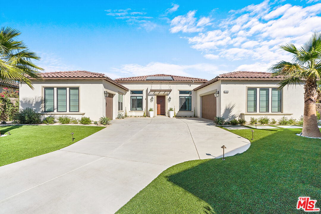 80464 Old Rnch Trail North La Quinta, CA 92253 - Photo 42 of 42 a front view of a house with a yard