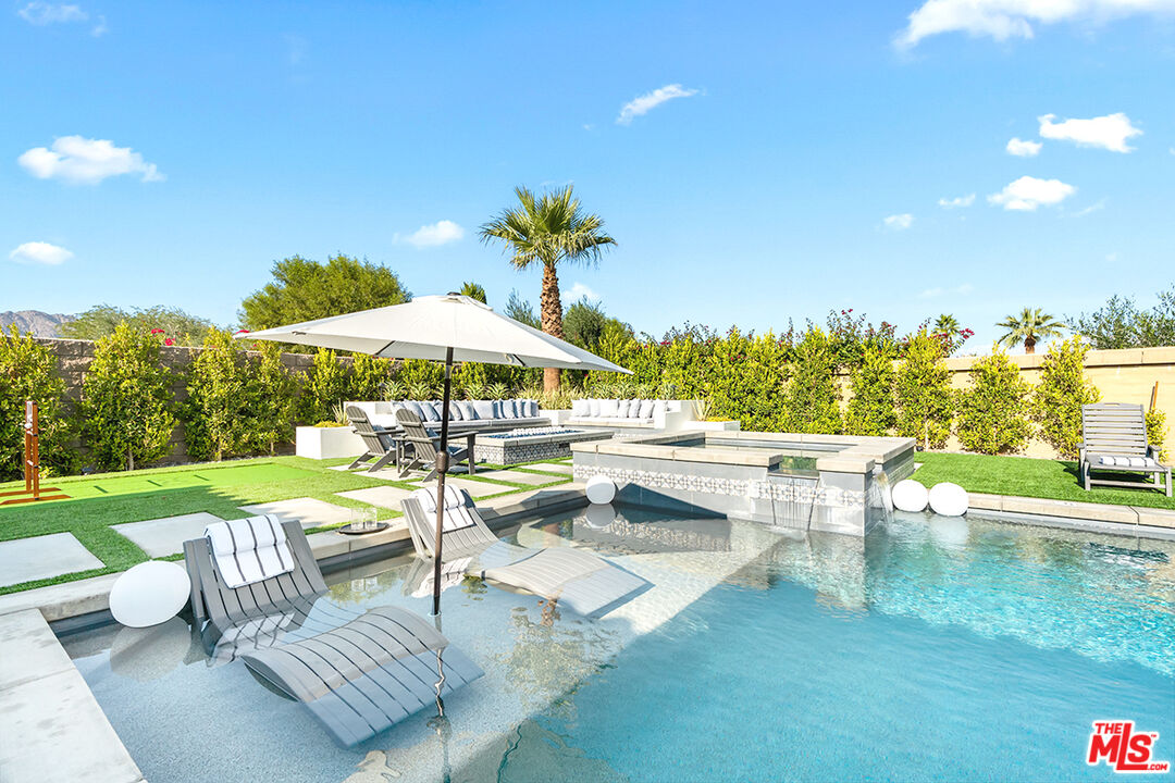 80464 Old Rnch Trail North La Quinta, CA 92253 - Photo 6 of 42 a view of a patio with chairs and a table