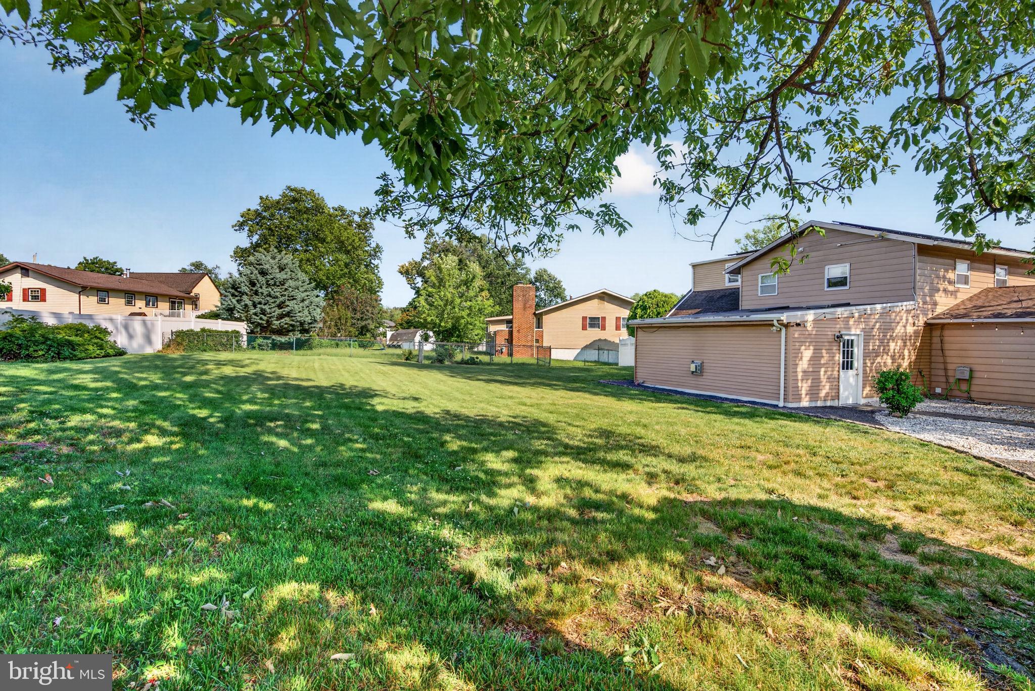 12 Woodbridge Road Gibbsboro, NJ 08026 - Photo 35 of 45 a view of a house with a big yard