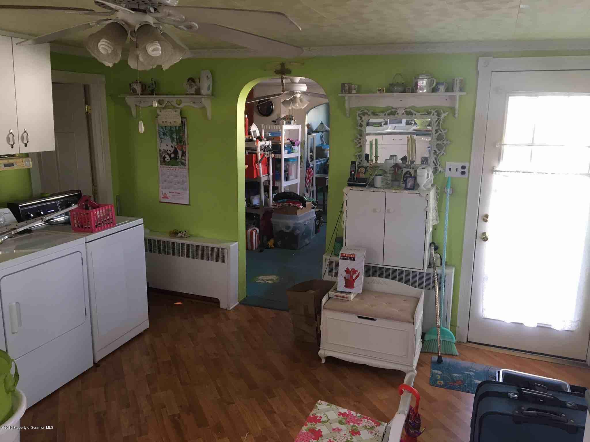 26 Main Street Inkerman, PA 18640 - Photo 6 of 16 a living room with furniture and a window