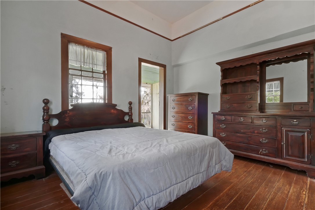 14009 Highway 99 Darien, GA 31305 - Photo 18 of 52 Bedroom 1 (upstairs) door to porch