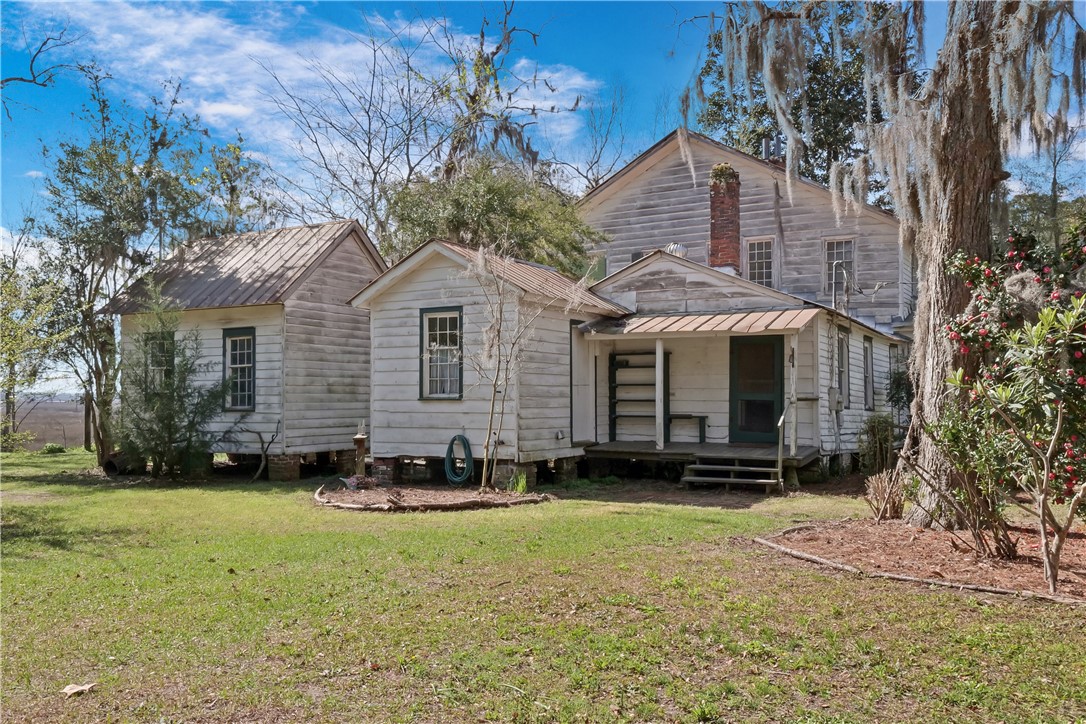 14009 Highway 99 Darien, GA 31305 - Photo 2 of 52 North side of the home