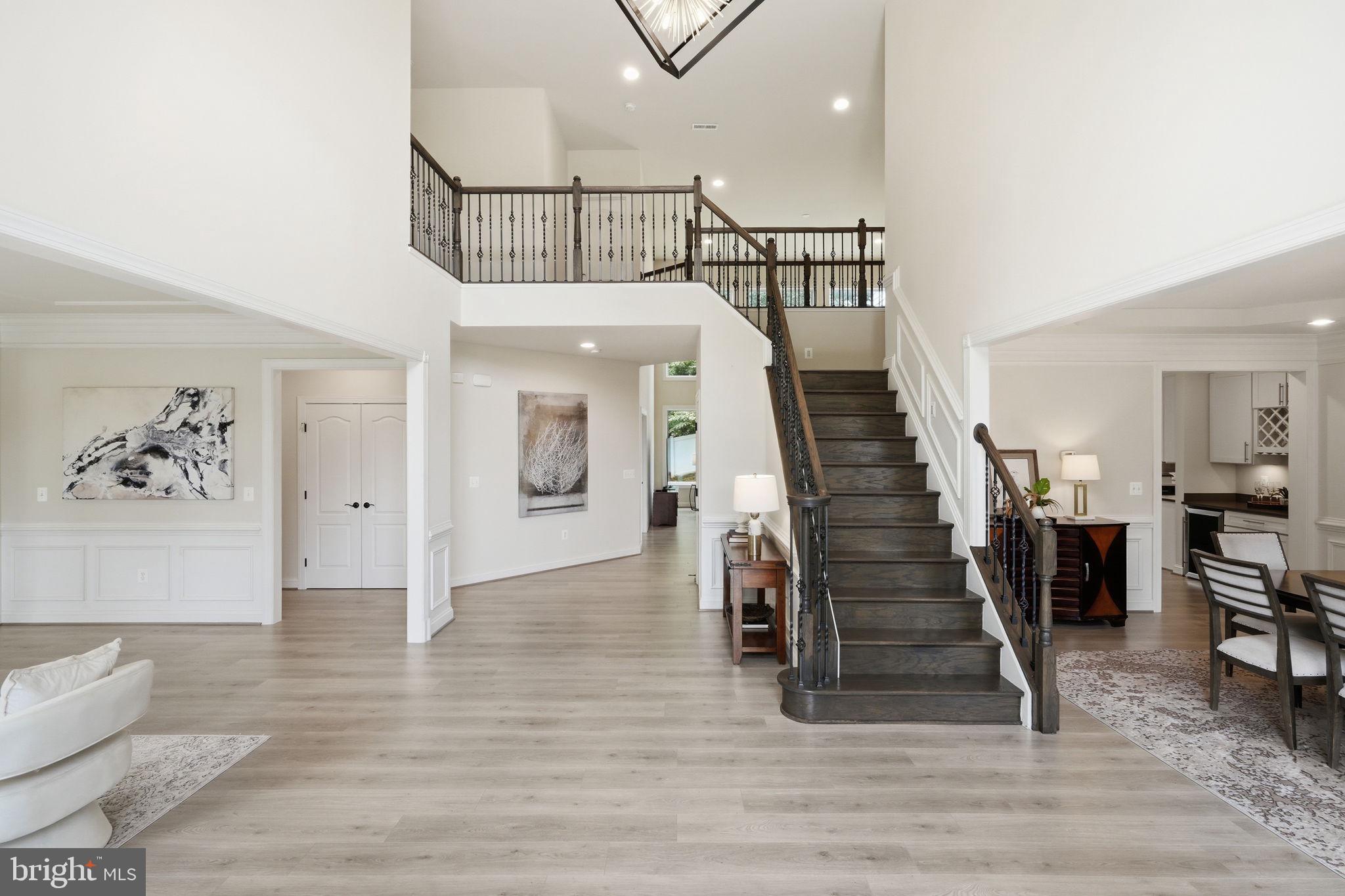 7821 Old Falls Road McLean, VA 22102 - Photo 4 of 62 a view of entryway and hall with wooden floor