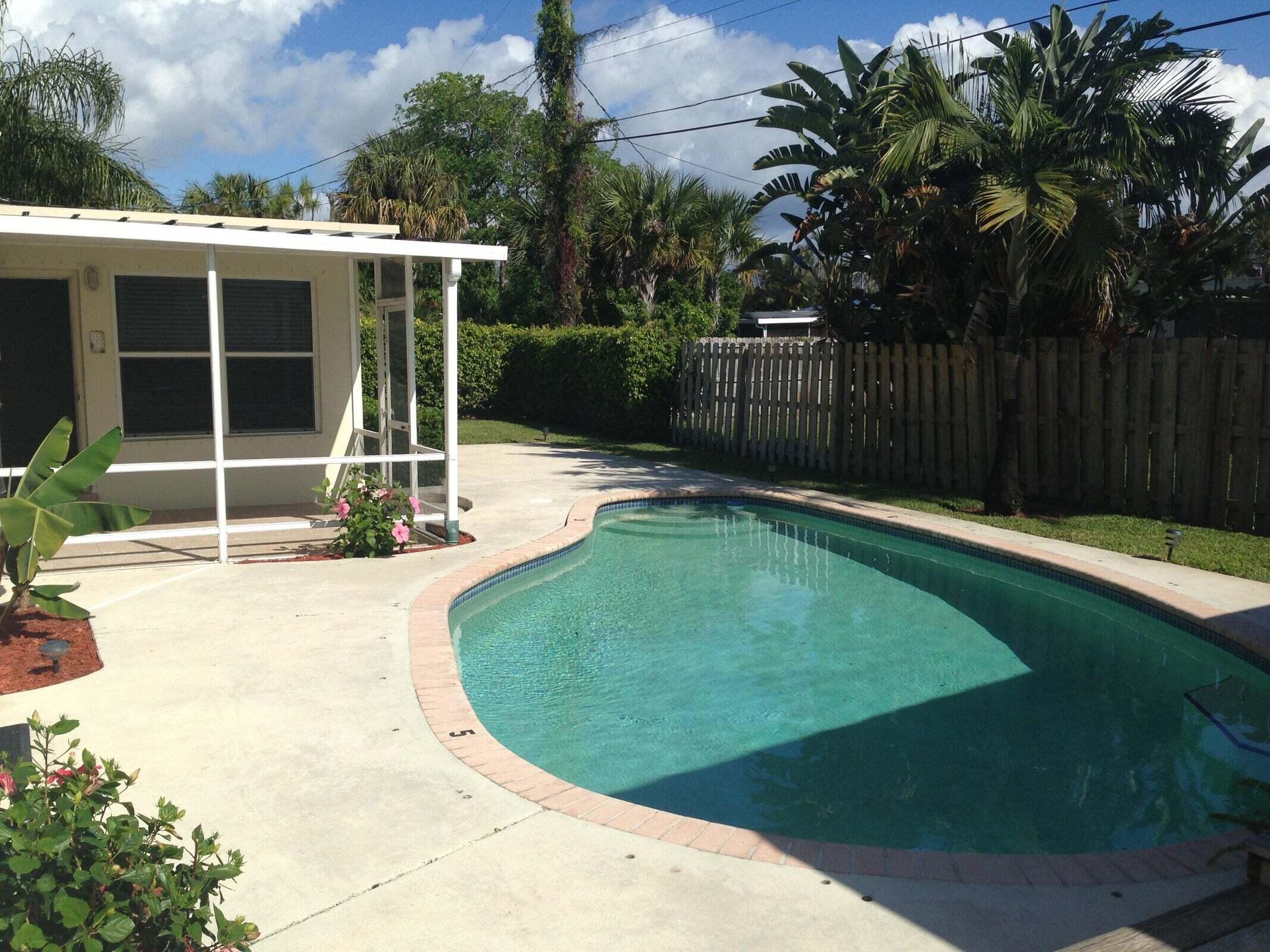 2098 Northeast 4th Court Boca Raton, FL 33431 - Photo 3 of 11 pool and fence