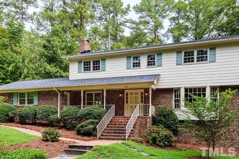 2942 Buckingham Road Durham, NC 27707 - Photo 2 of 25 a front view of a house with garden and porch