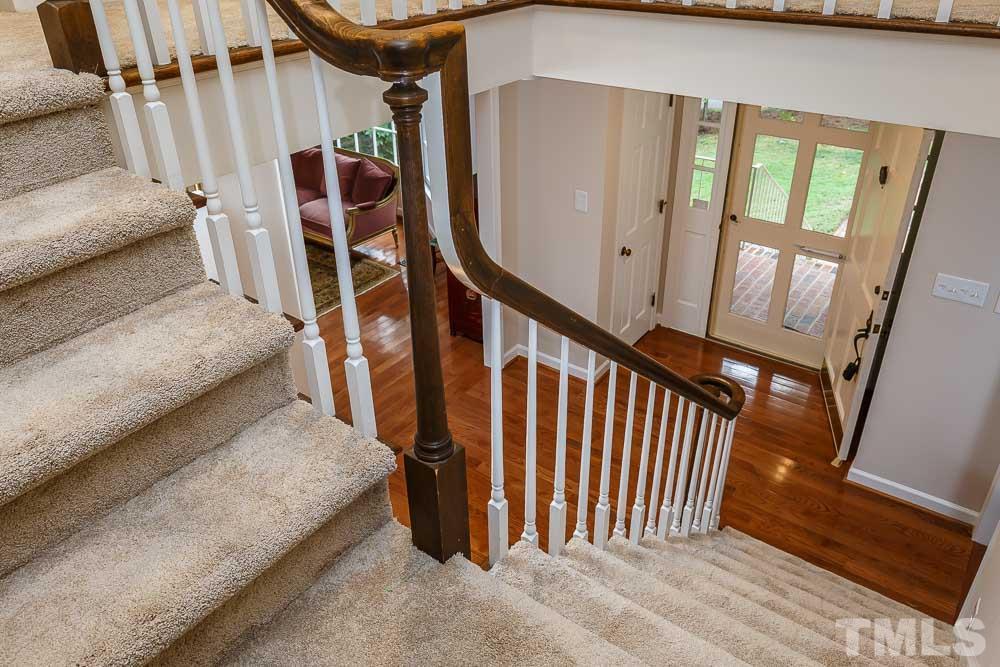 2942 Buckingham Road Durham, NC 27707 - Photo 12 of 25 a view of an entryway with staircase
