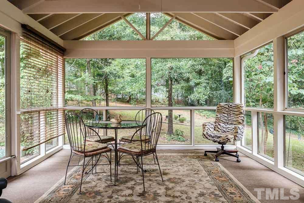 2942 Buckingham Road Durham, NC 27707 - Photo 19 of 25 a view of a porch with chairs and backyard