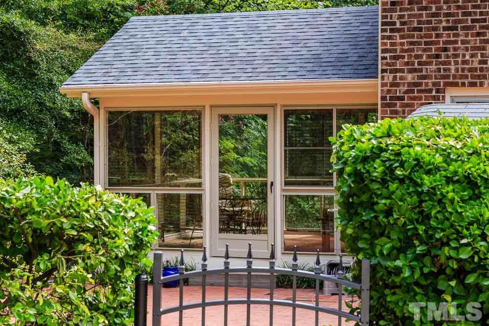 2942 Buckingham Road Durham, NC 27707 - Photo 23 of 25 a house view with a garden space