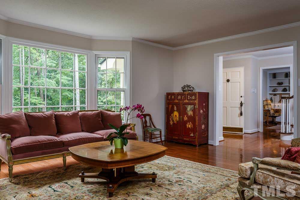 2942 Buckingham Road Durham, NC 27707 - Photo 9 of 25 a living room with furniture and wooden floor
