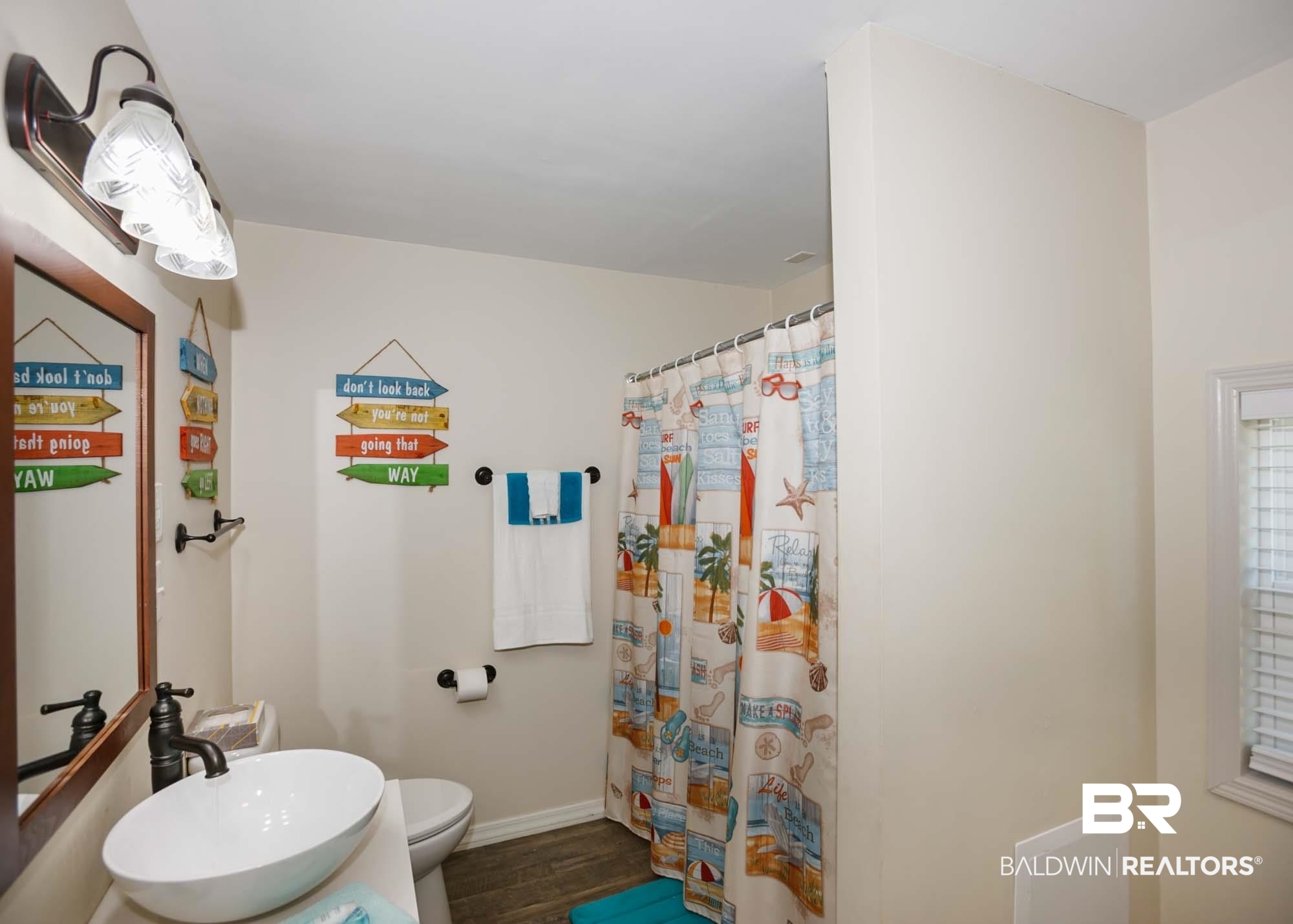 18753 County Road 12 Foley, AL 36535 - Photo 35 of 39 Bathroom featuring hardwood / wood-style floors, toilet, and sink