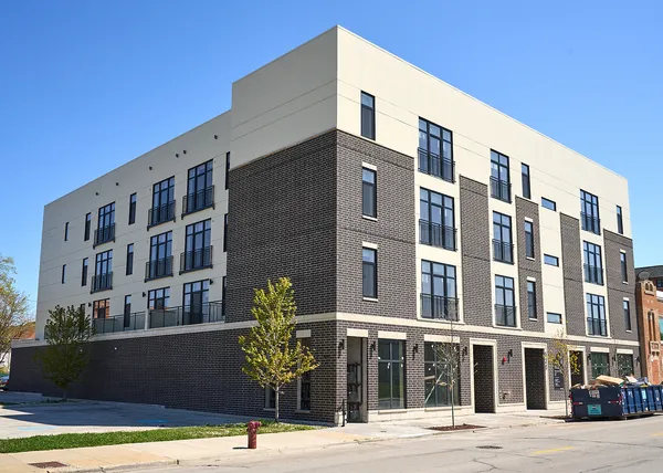 a view of a building with a street