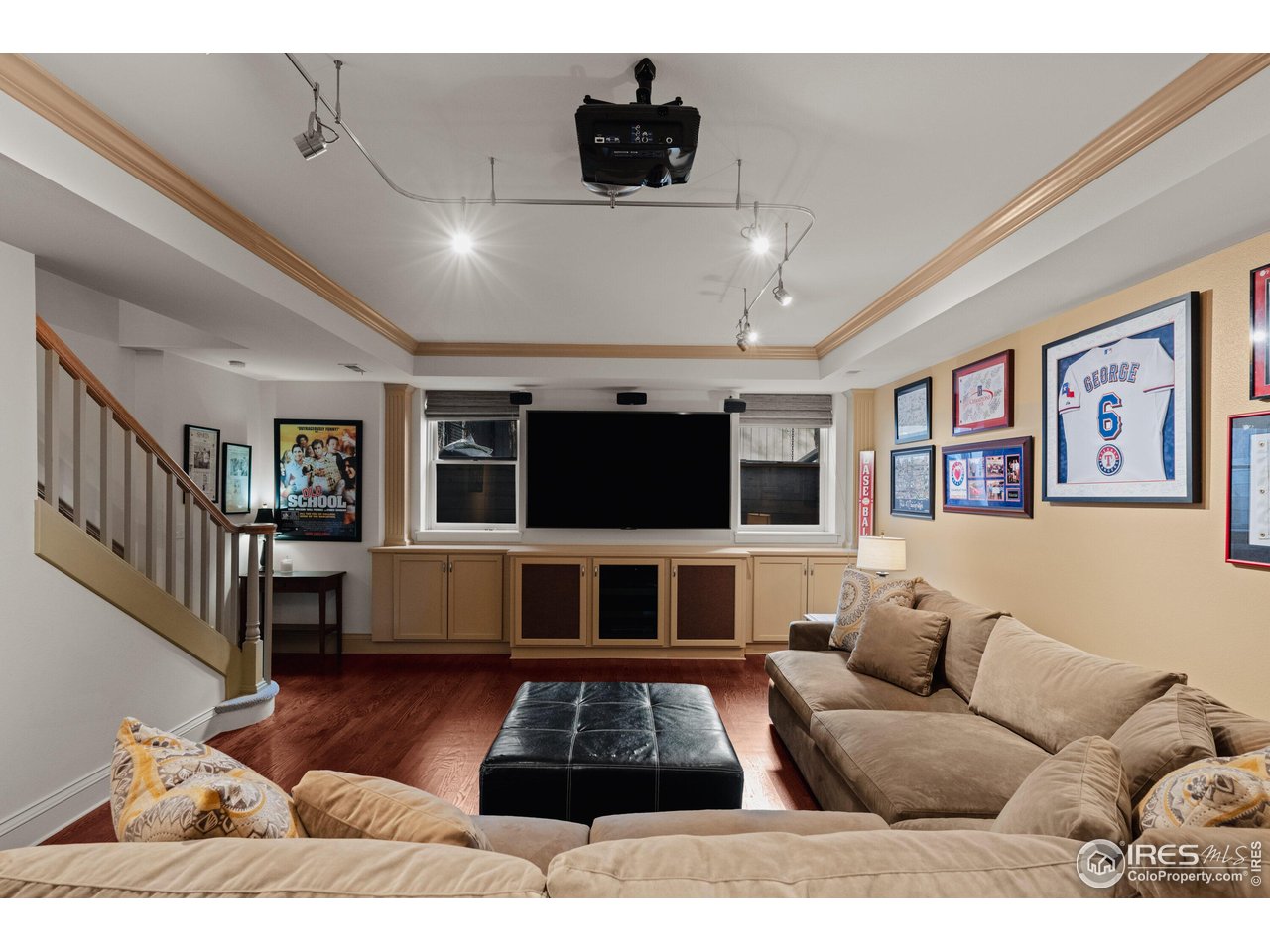 820 6th Street Boulder, CO 80302 - Photo 22 of 29 a living room with furniture and a flat screen tv