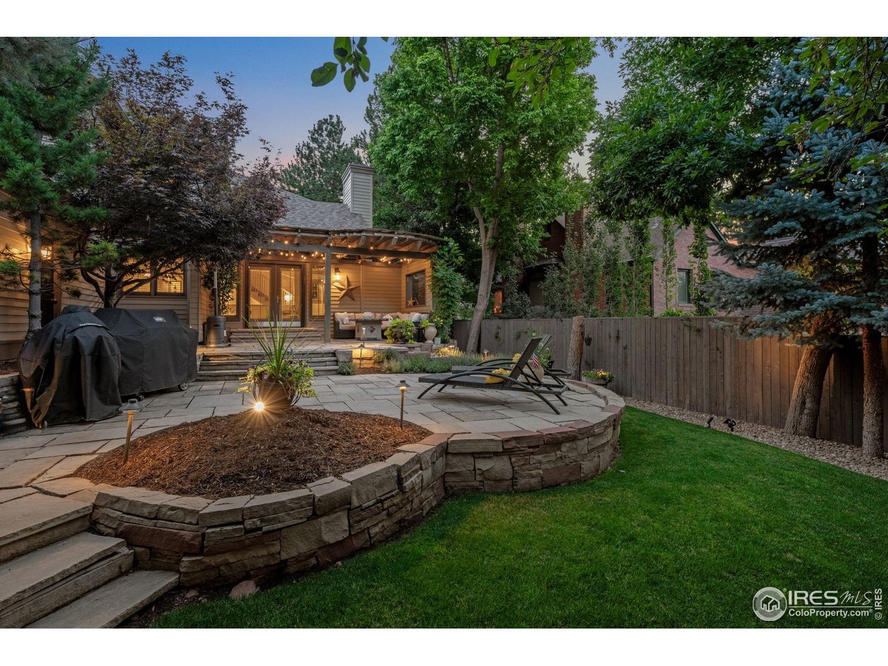 820 6th Street Boulder, CO 80302 - Photo 23 of 29 a view of a backyard with plants and patio