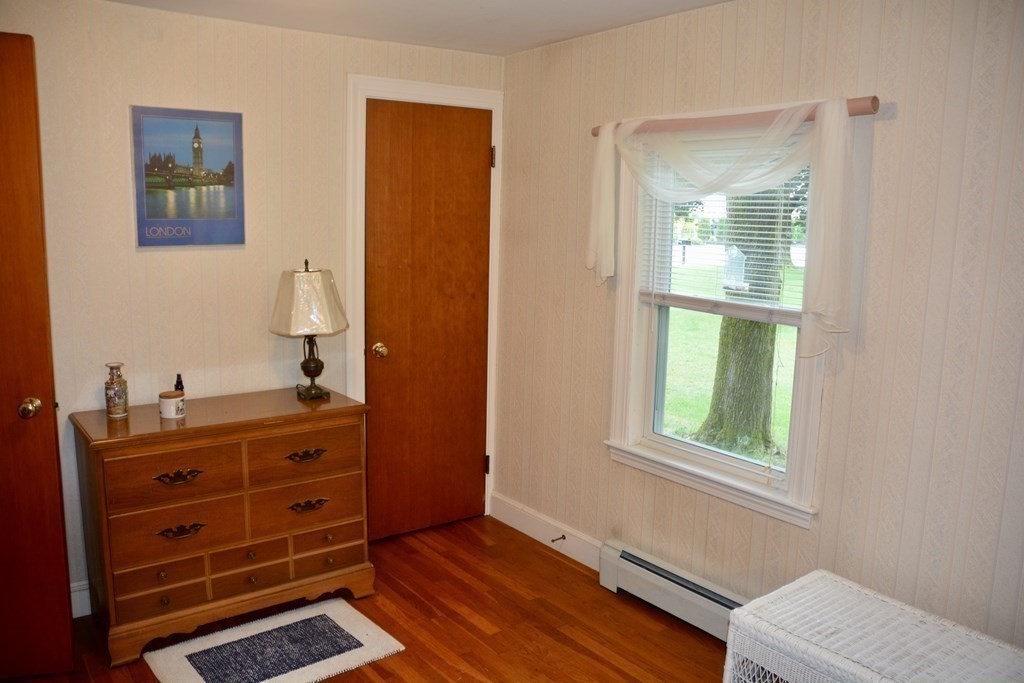 48 Randolph Street Canton, MA 02021 - Photo 11 of 21 a room with a dresser and a window