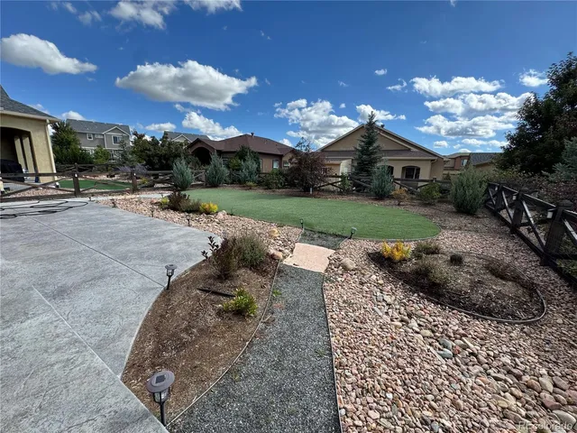 a view of a porch with a yard