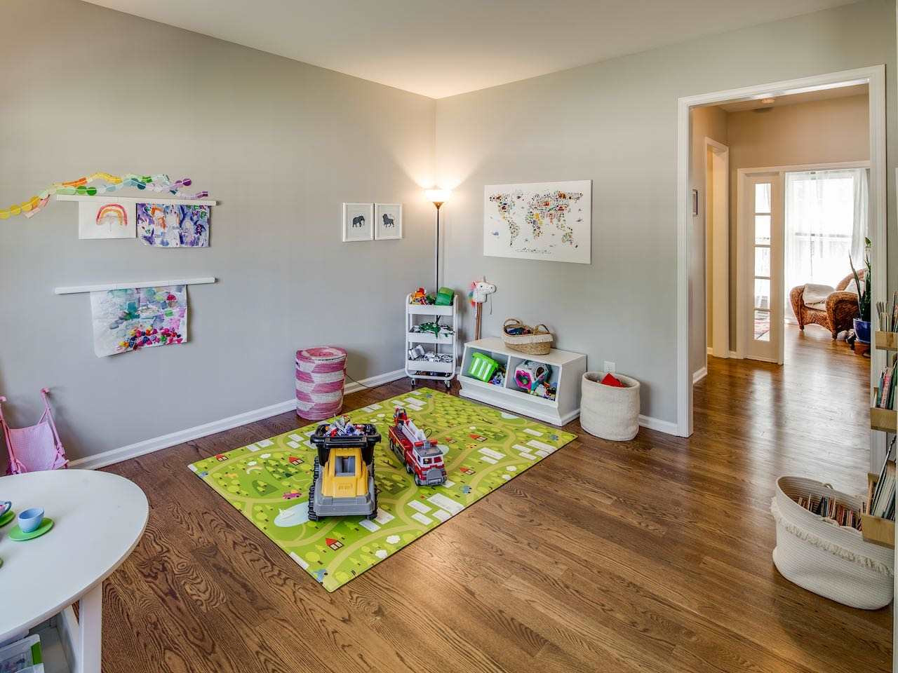 7780 Silver View Lane Raleigh, NC 27613 - Photo 18 of 30 When the house was built Pulte called this the living room. But who needs a formal living room when you have a large and open family room? What is much more practical is a playroom. Voila. Playroom