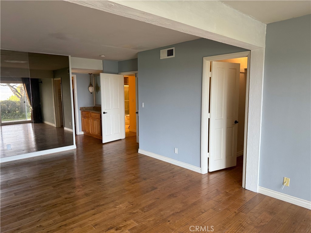 1 Oaktree Lane Rolling Hills Estates, CA 90274 - Photo 11 of 20 an empty room with wooden floor and windows