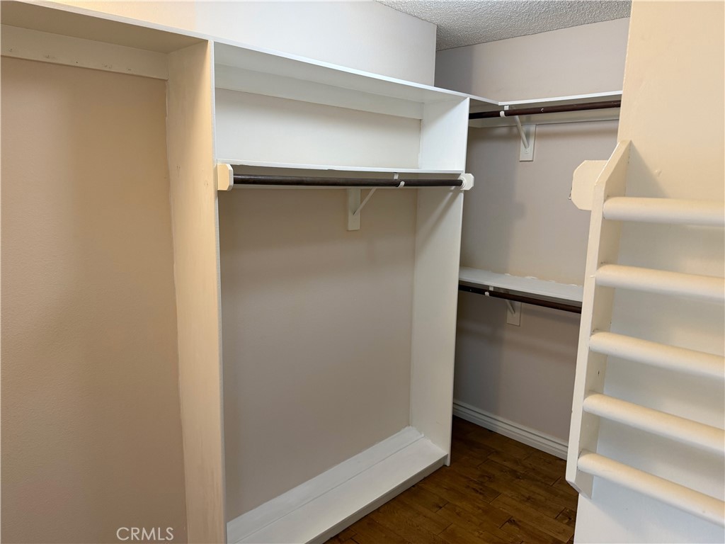 1 Oaktree Lane Rolling Hills Estates, CA 90274 - Photo 13 of 20 a view of walk in closet with empty racks
