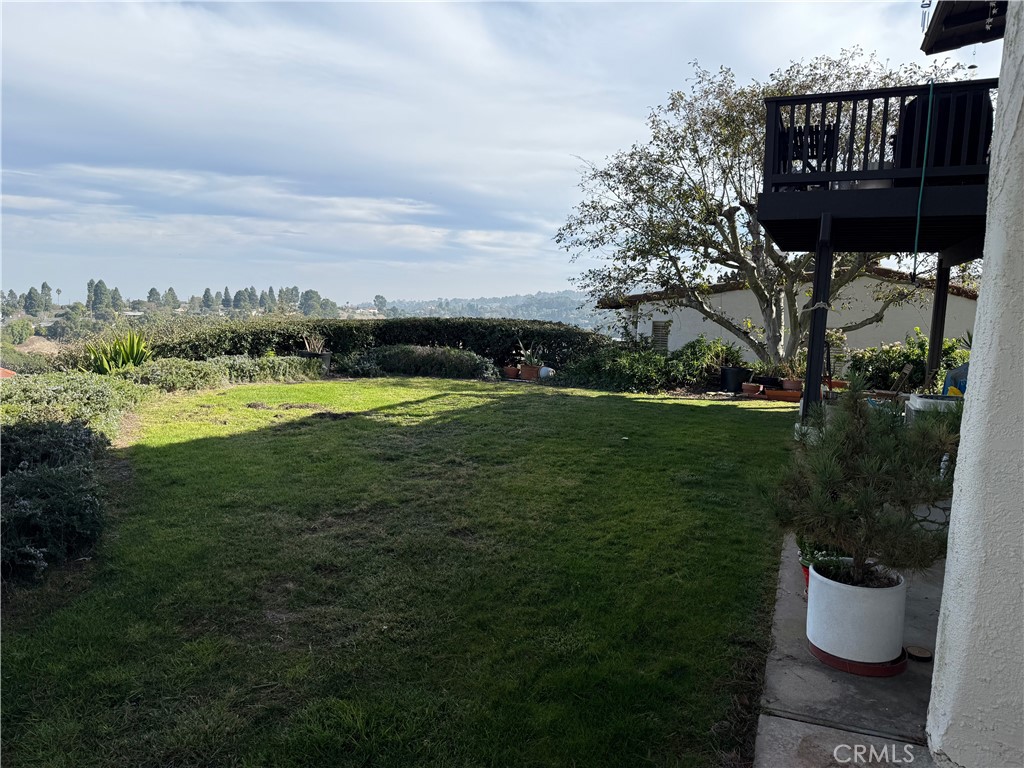 1 Oaktree Lane Rolling Hills Estates, CA 90274 - Photo 17 of 20 a view of a terrace with yard and lake view