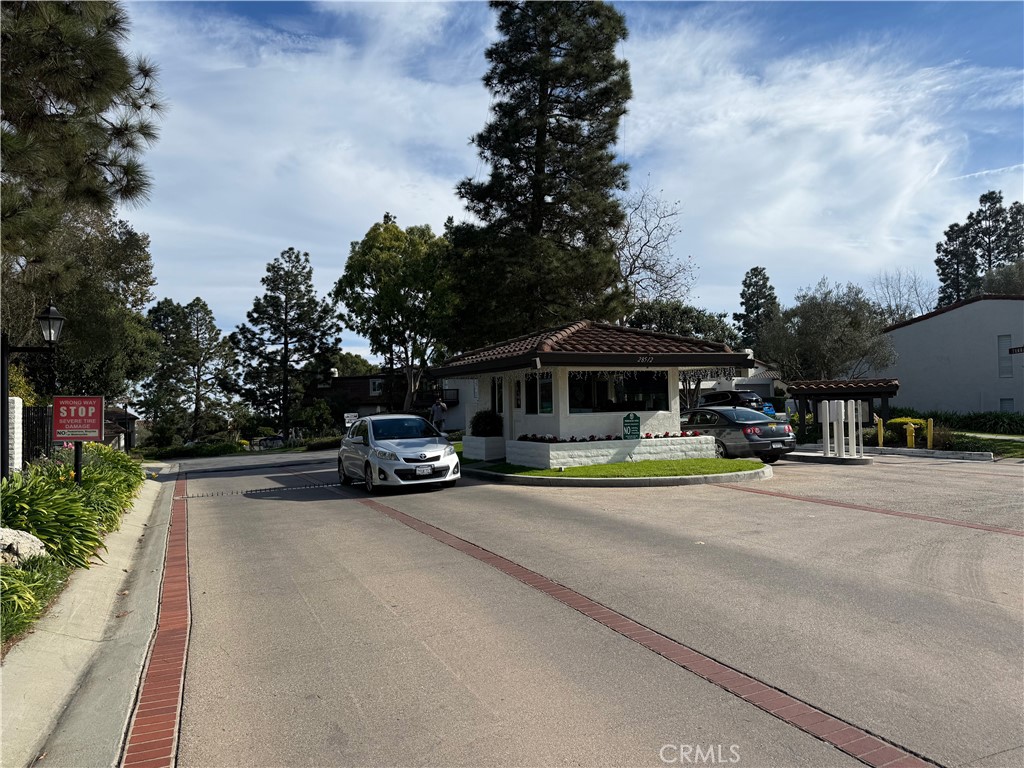 1 Oaktree Lane Rolling Hills Estates, CA 90274 - Photo 20 of 20 a view of a house with car parked
