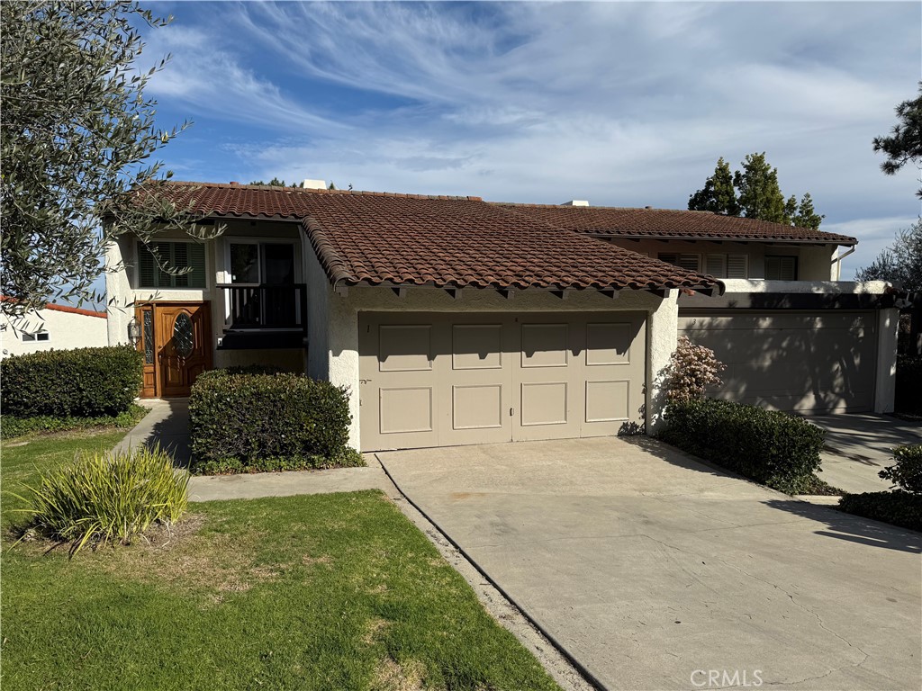 1 Oaktree Lane Rolling Hills Estates, CA 90274 - Photo 2 of 20 a front view of a house with a yard