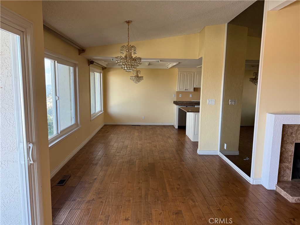 1 Oaktree Lane Rolling Hills Estates, CA 90274 - Photo 6 of 20 a view of a big room with wooden floor and a window