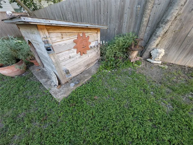 a view of a backyard with plants