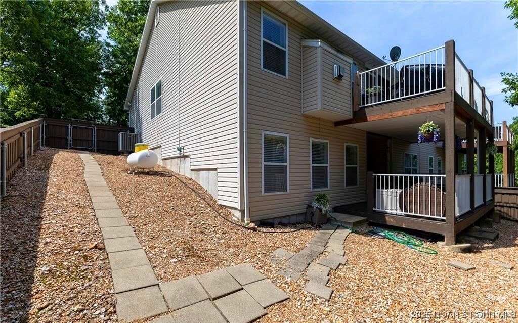4331 Sunset Drive, Unit B Osage Beach, MO 65065 - Photo 34 of 36 Fenced in Yard