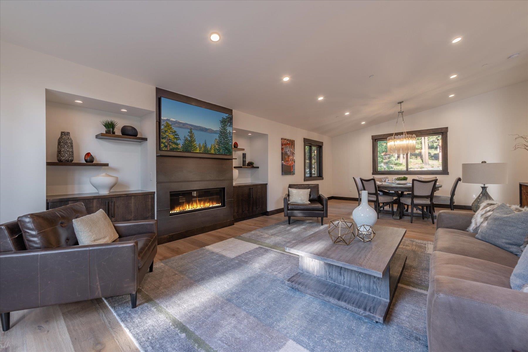 15330 Wolfgang Road Truckee, CA 96161 - Photo 4 of 21 a living room with furniture and a fireplace