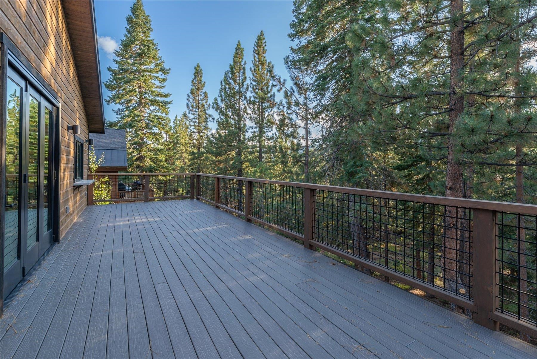 15330 Wolfgang Road Truckee, CA 96161 - Photo 5 of 21 a view of a balcony with wooden floor and fence