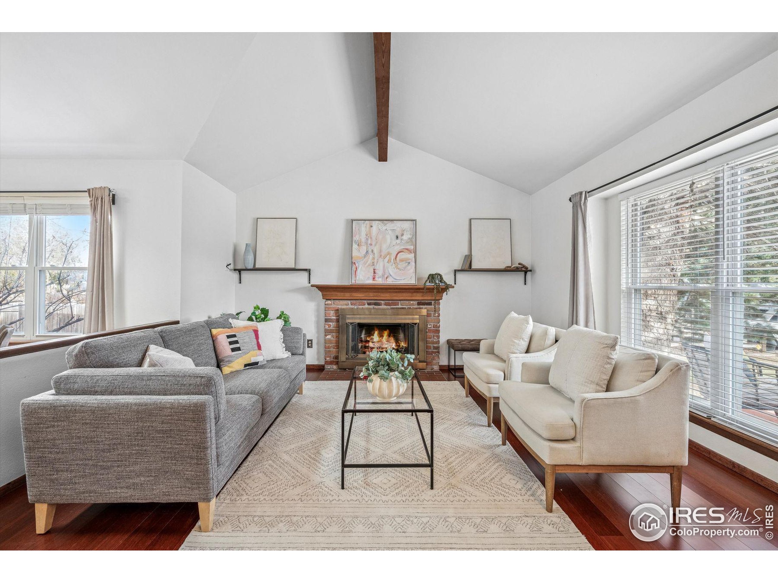 4541 Ensenada Street Denver, CO 80249 - Photo 9 of 35 a living room with furniture and a large window
