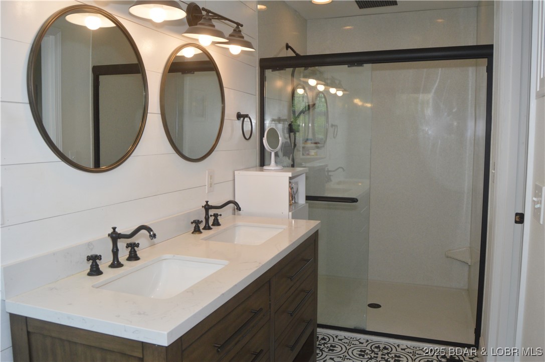 21 Winston Lane Kaiser, MO 65047 - Photo 11 of 43 Double sinks with custom walk in shower