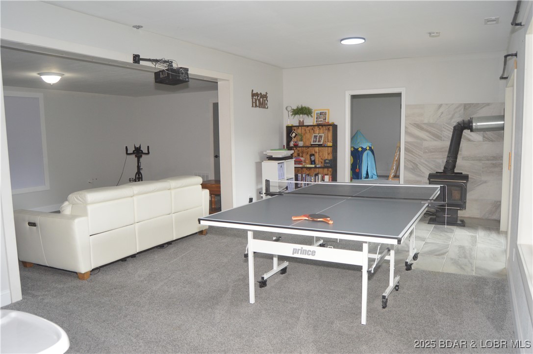 21 Winston Lane Kaiser, MO 65047 - Photo 23 of 43 Lower level is the perfect spot for movies and gam