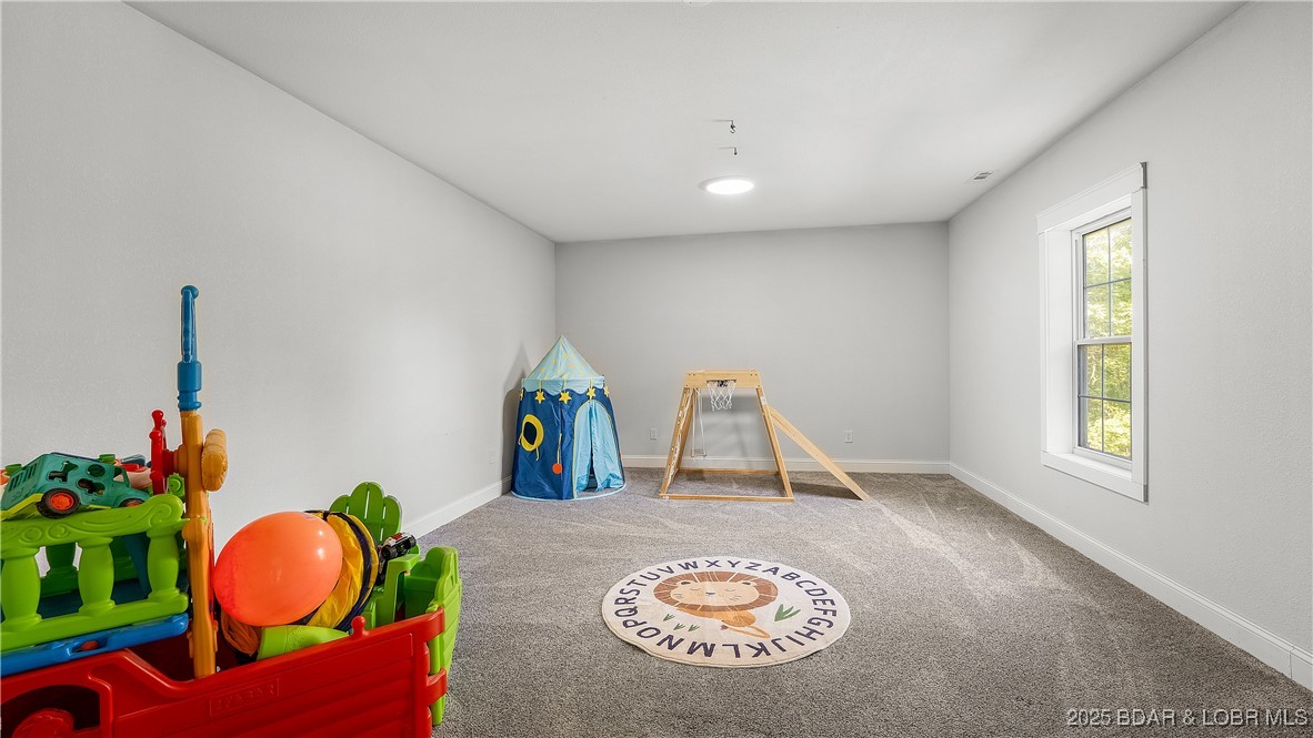 21 Winston Lane Kaiser, MO 65047 - Photo 27 of 43 Large Bedroom/Playroom on lower level