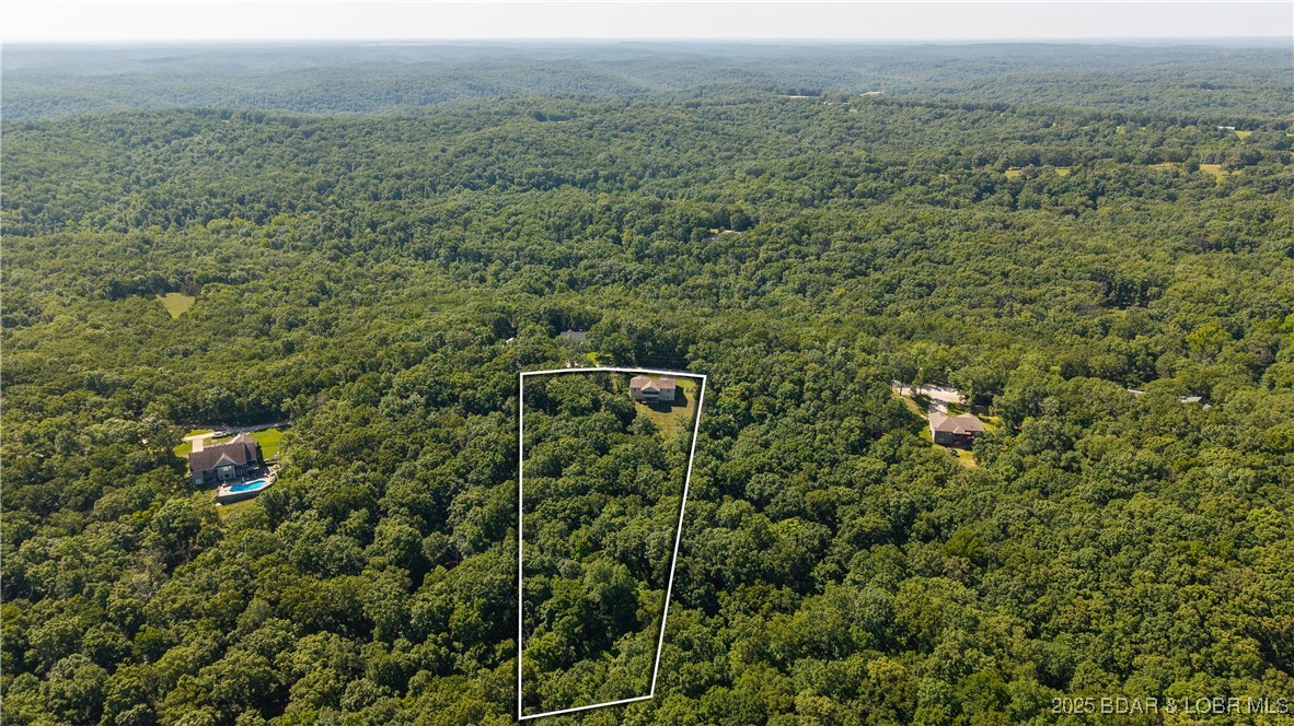 21 Winston Lane Kaiser, MO 65047 - Photo 41 of 43 Tons of privacy on your large wooded lot only minu
