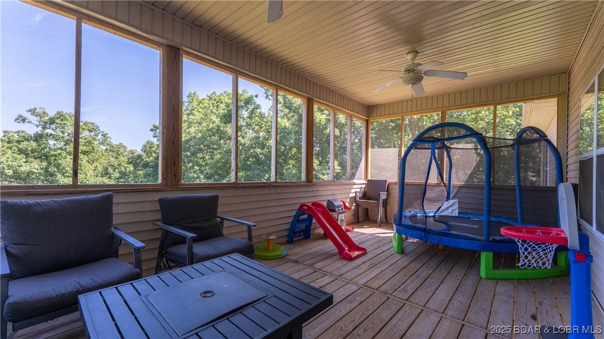 21 Winston Lane Kaiser, MO 65047 - Photo 7 of 43 The large screened porch is perfect for everyone t