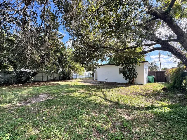 a fire hydrant in the middle of a field