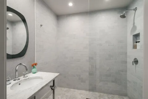 a bathroom with a sink and a mirror