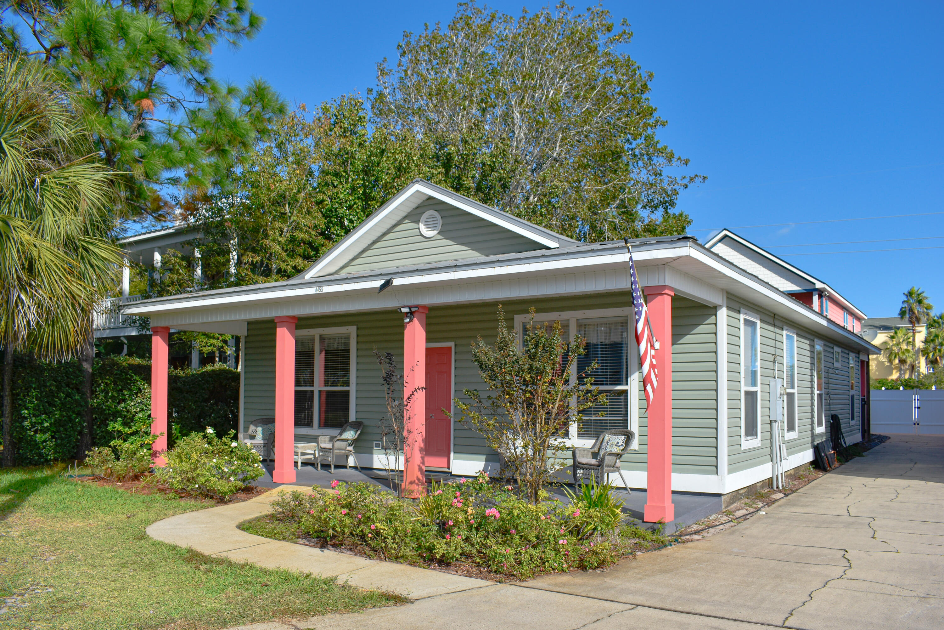a front view of a house with garden