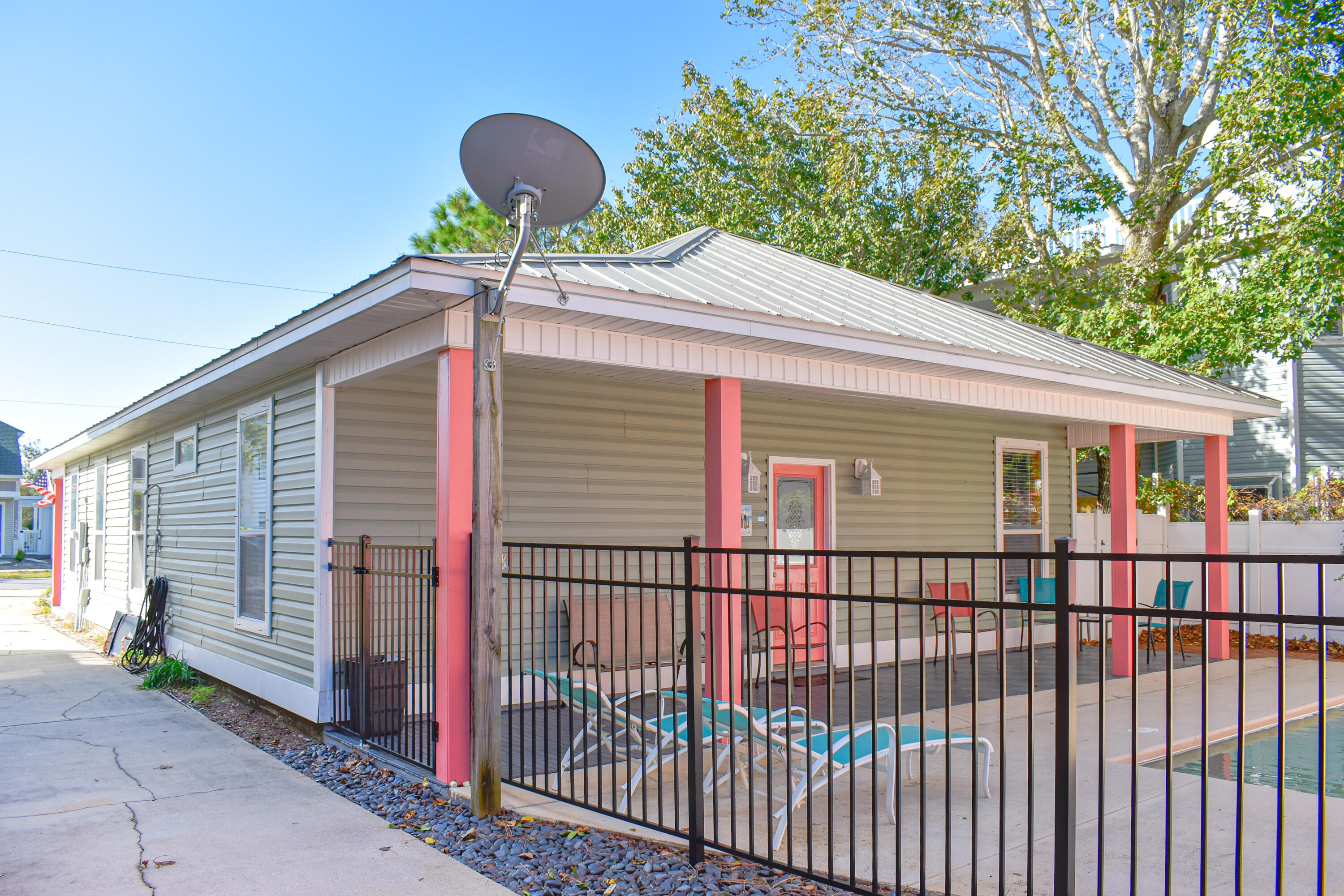 4455 Luke Avenue Destin, FL 32541 - Photo 11 of 44 a front view of a house with many windows