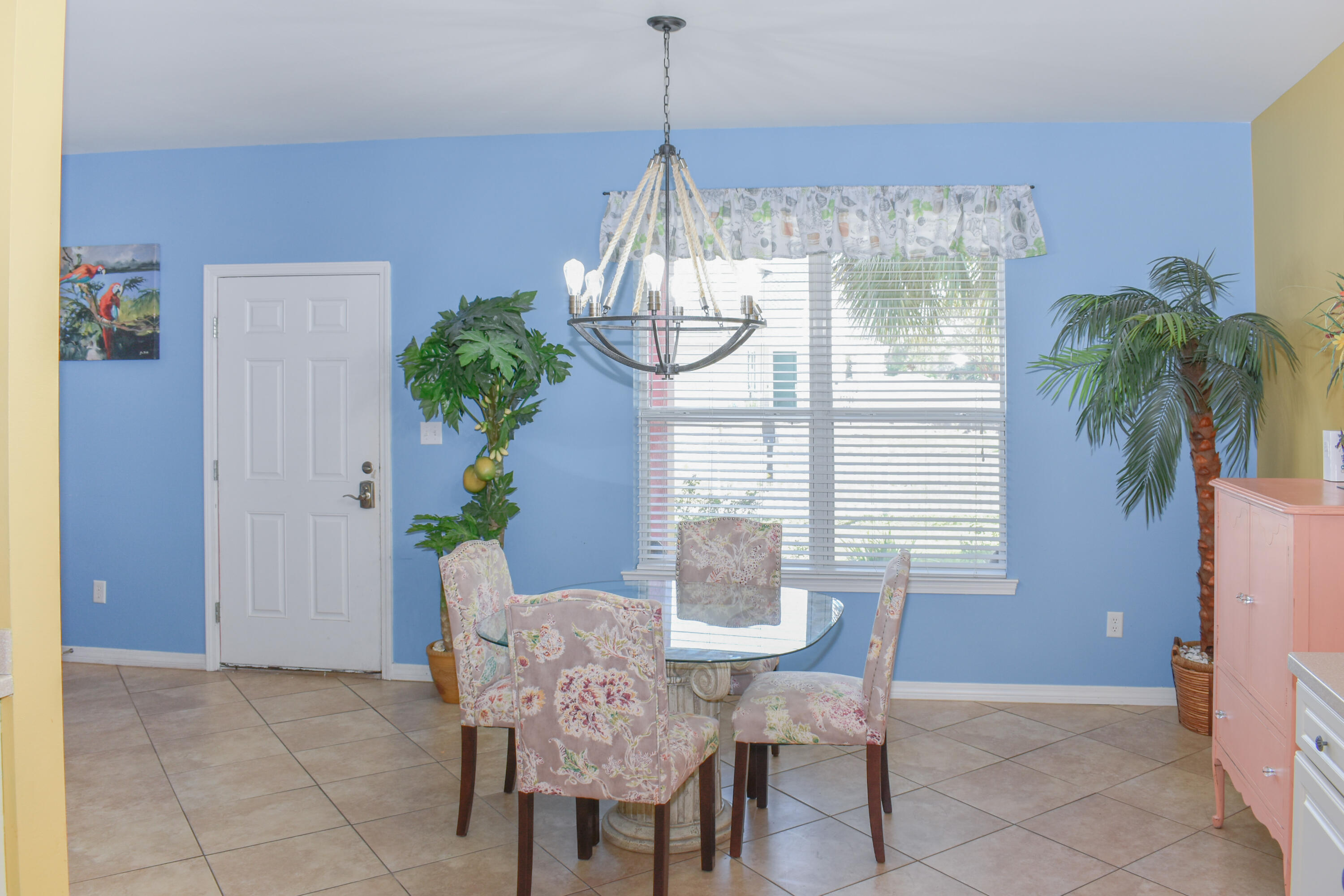 4455 Luke Avenue Destin, FL 32541 - Photo 17 of 44 a dining room filled with furniture and window