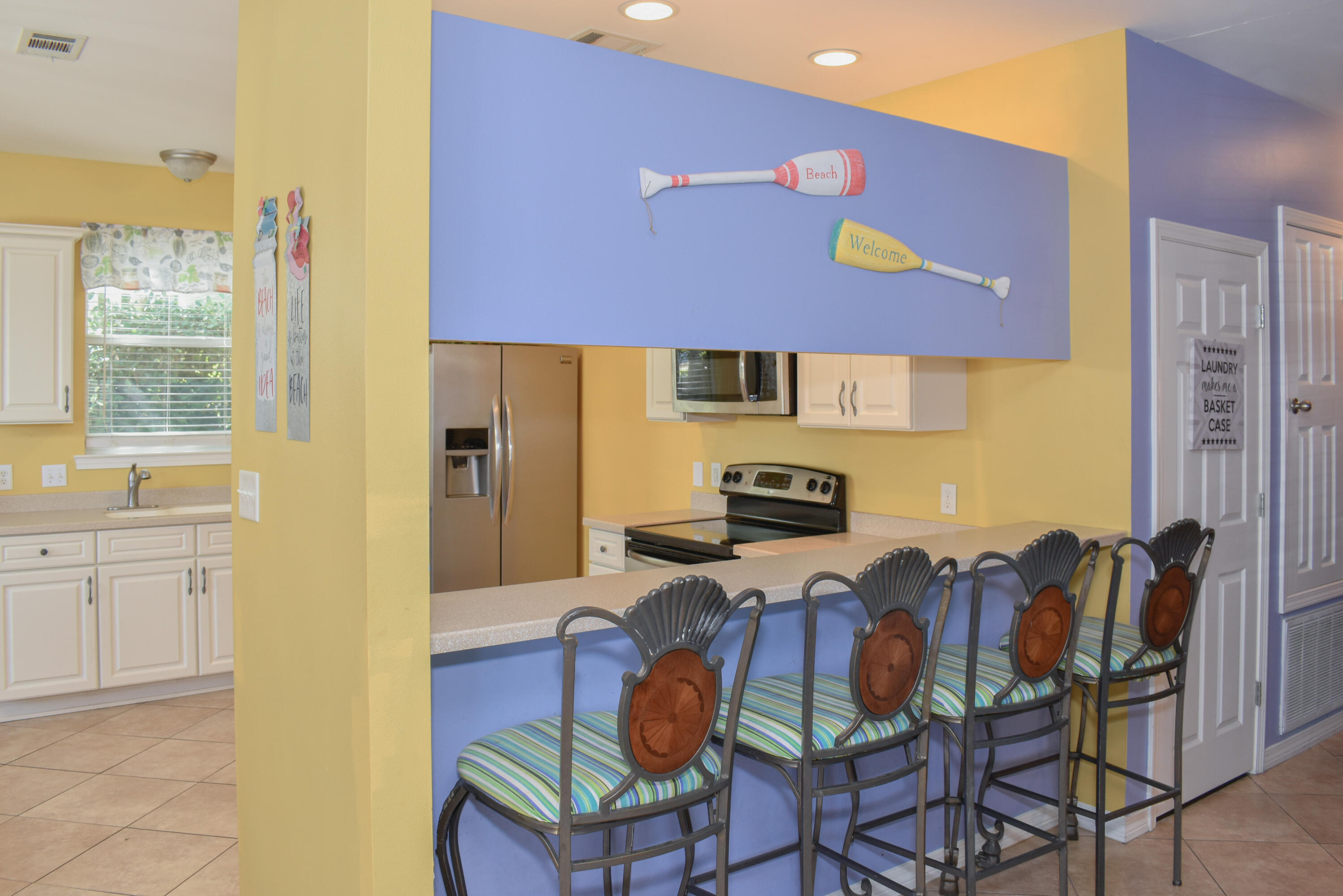 4455 Luke Avenue Destin, FL 32541 - Photo 20 of 44 a view of a dining room with furniture